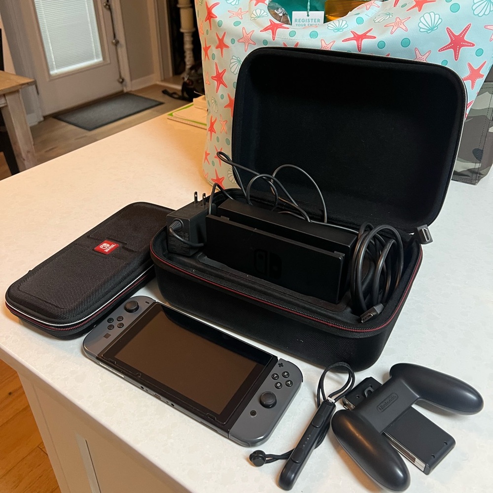 Nintendo Switch with Gray Joy-Con and Black Case V1